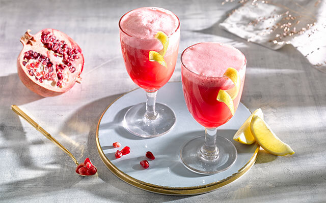 Pomegranate Brandy Sour - Cocktail Contessa