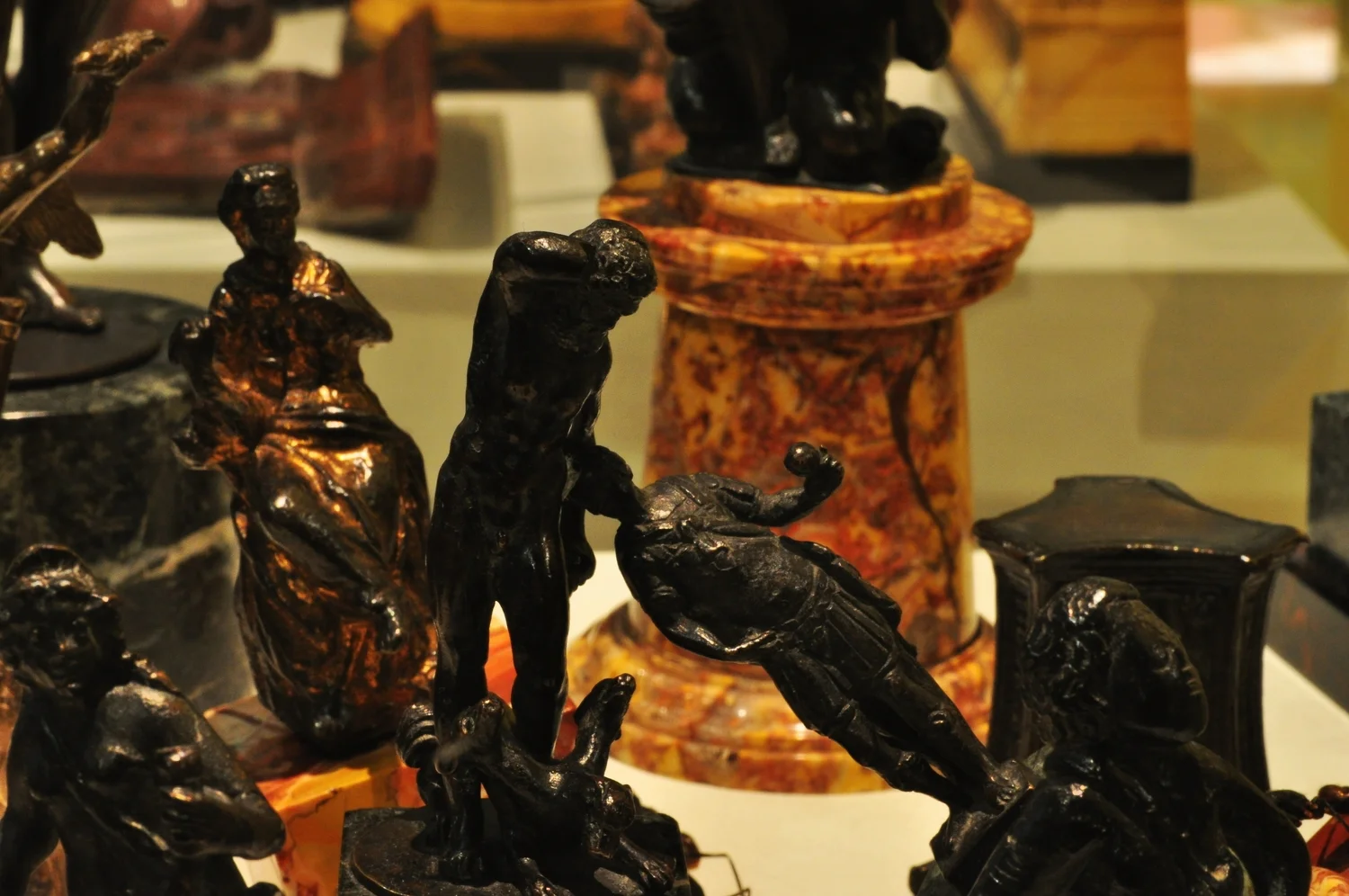  The fairies topple bronze statuettes using apostle spoons and hair stolen from a smashed Victorian mourning brooch. Determined to overpower Hercules and his companions they are aided by an army of giant ants. 