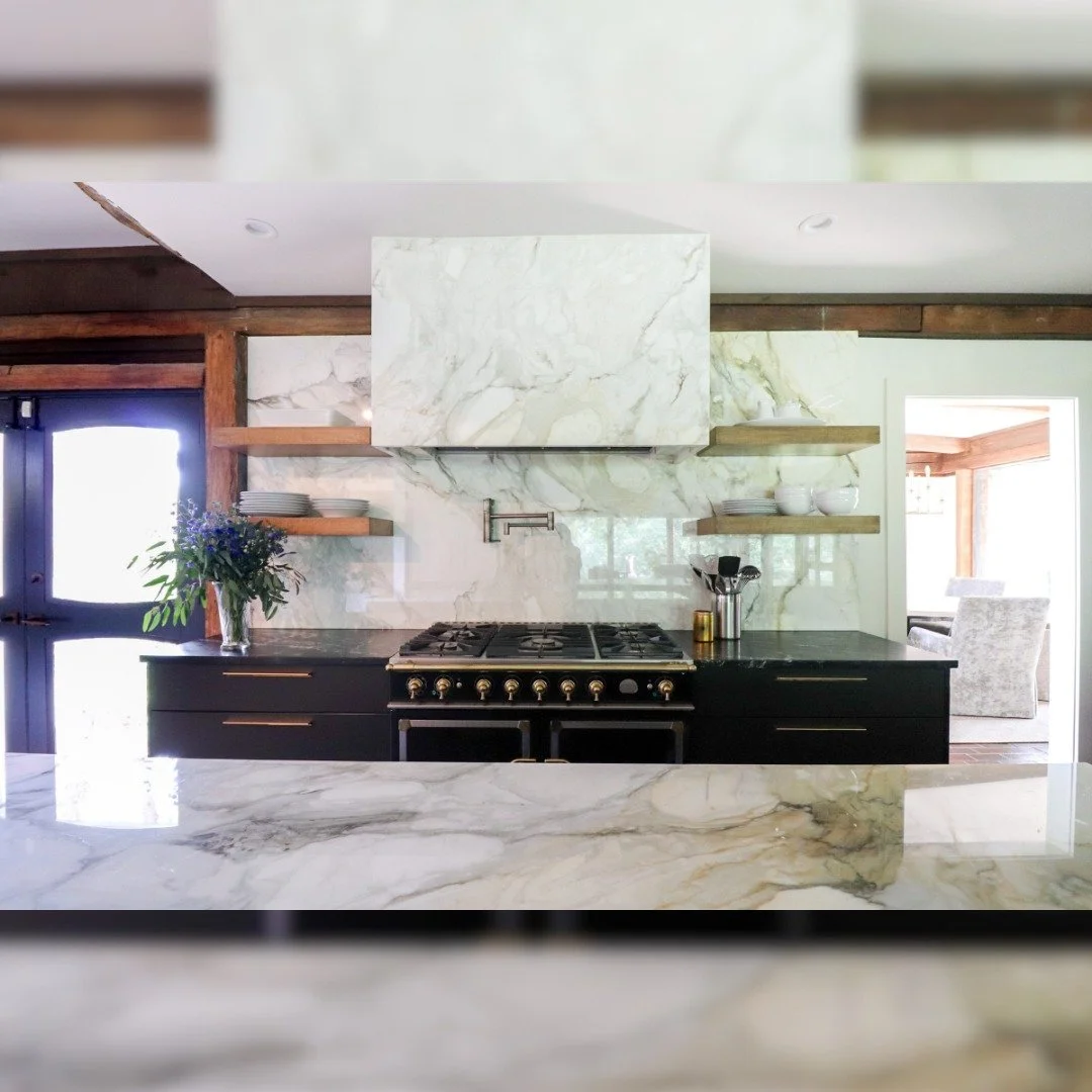 We took a classic palette—black and white—and gave it scale. Marble wraps the walls, drawers anchor the space, and natural light balances it all.
What’s your favorite part of this kitchen?