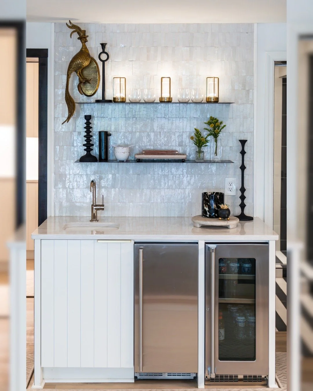 This wet bar packs a punch! You don’t need a lot of space to craft the perfect drink. What’s your go-to beverage for cozy fall evenings?