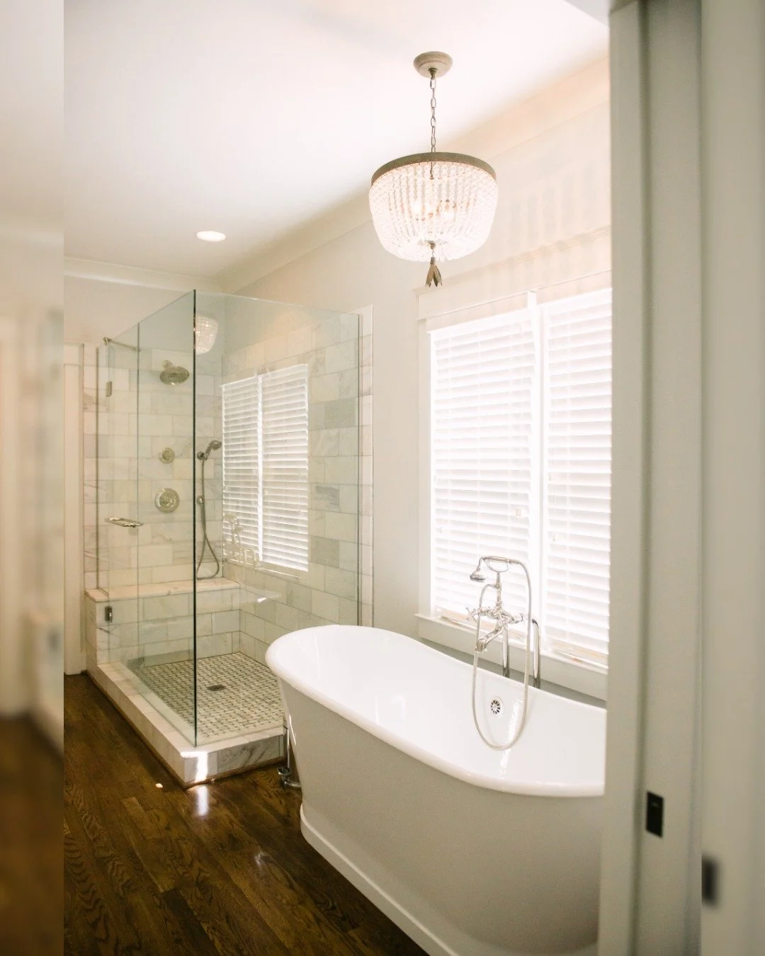 Cold nights, warm baths. This renovated bathroom is the perfect winter escape &mdash; calm, clean, and cozy.