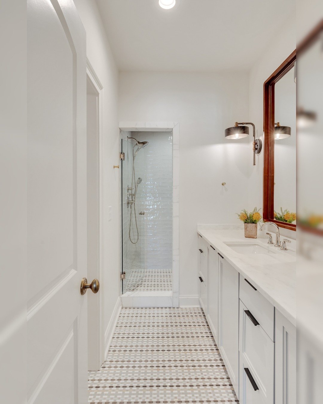 This boys&rsquo; bathroom proves that simple can still be full of style. We kept things modern and masculine with subtle texture, timeless materials, and a clean palette that will grow with him for years to come.
