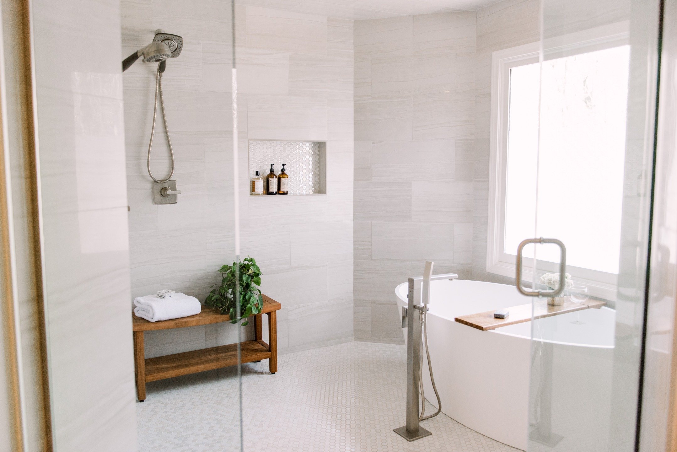 Cold weather calls for warm baths. 

This bathroom renovation was designed with comfort in mind soft finishes, clean lines, and a tub that&rsquo;s basically begging for a long soak.

The timeless design makes this space feel just as calming and beaut