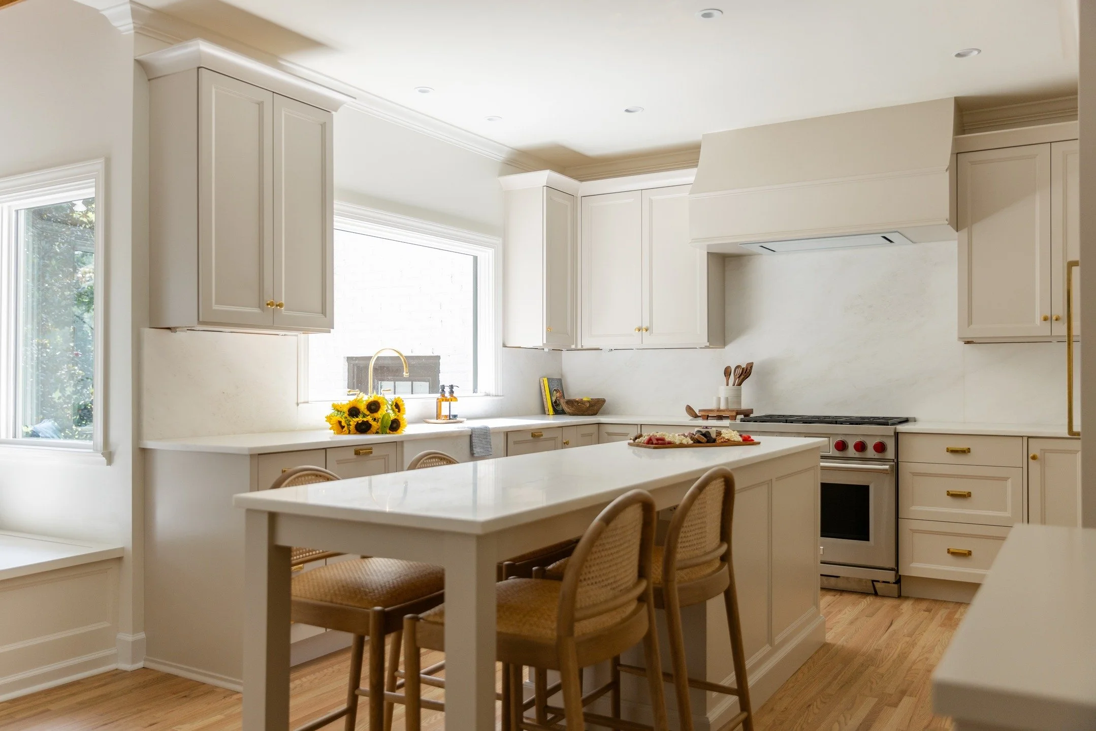 Reworking the awkward peninsula into a larger island completely transformed this kitchen&mdash;opening up the flow, bringing in more natural light, and making the space feel so much more conversational. 

Just one of the many things to love about thi