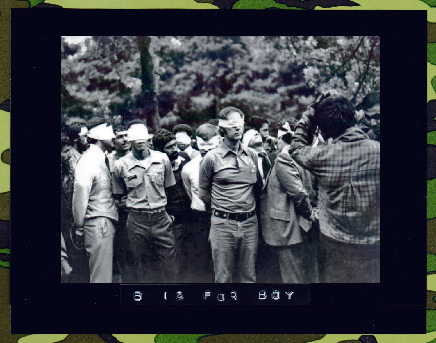 Blindfolded American hostages are gathered before the public and photographed by their Iranian captors on November 4, 1979, the first day of occupation of the U.S. Embassy in Tehran. The picture, obtained by UPI after the FBI showed no interest, was brought into the U.S. by an Iranian.