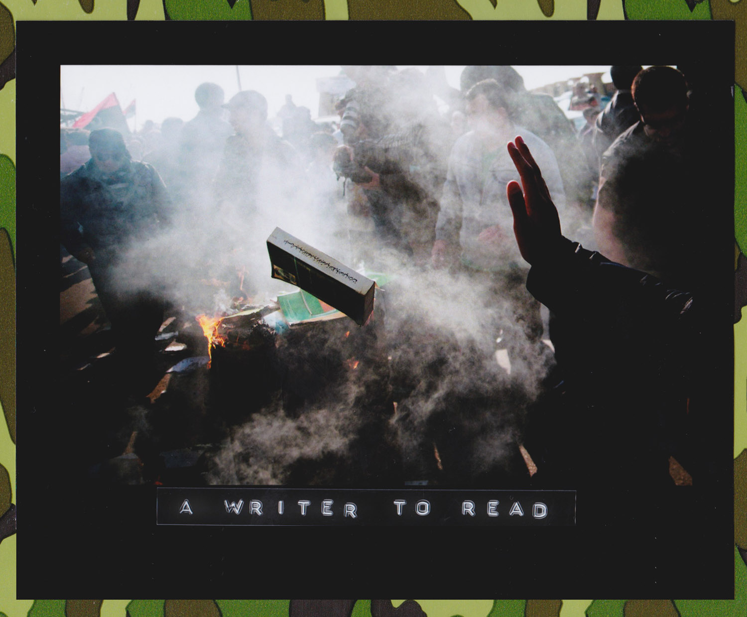 A group of Benghazi citizens gather to burn hundreds of copies of Colonel Muammar Gaddafi's 'Green Book' near the court in Benghazi, Libya, 02 April 2011. The Green Book is a manual outlining the political strategy and philosophy of Libyan leader Gaddafi, and is a symbol of his 42-year rule which rebels fought to overthrow. (Photo: Manu Brabo/Associated Press)