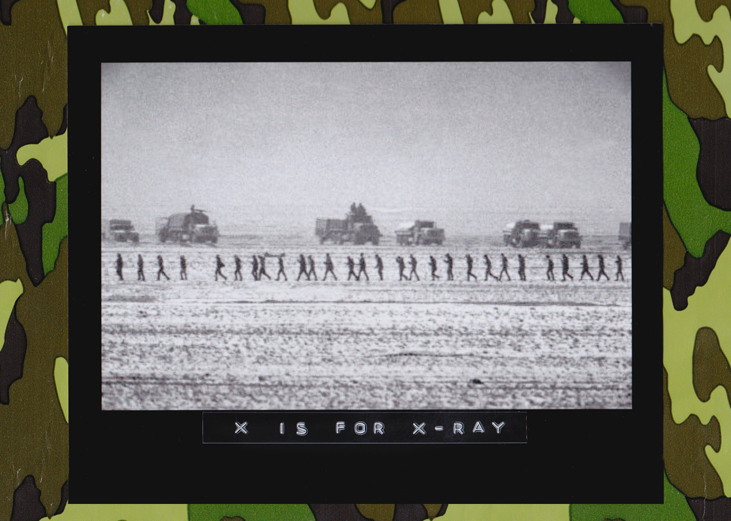 A line of captured Iraqi soldiers are marched through the desert in Kuwait past a group of U.S. Marine Second Division vehicles Sunday morning, February 24, 1991, after the ground offensive got underway during the Persian Gulf War. (Photo: Sadayuki Mikami/Associated Press) 