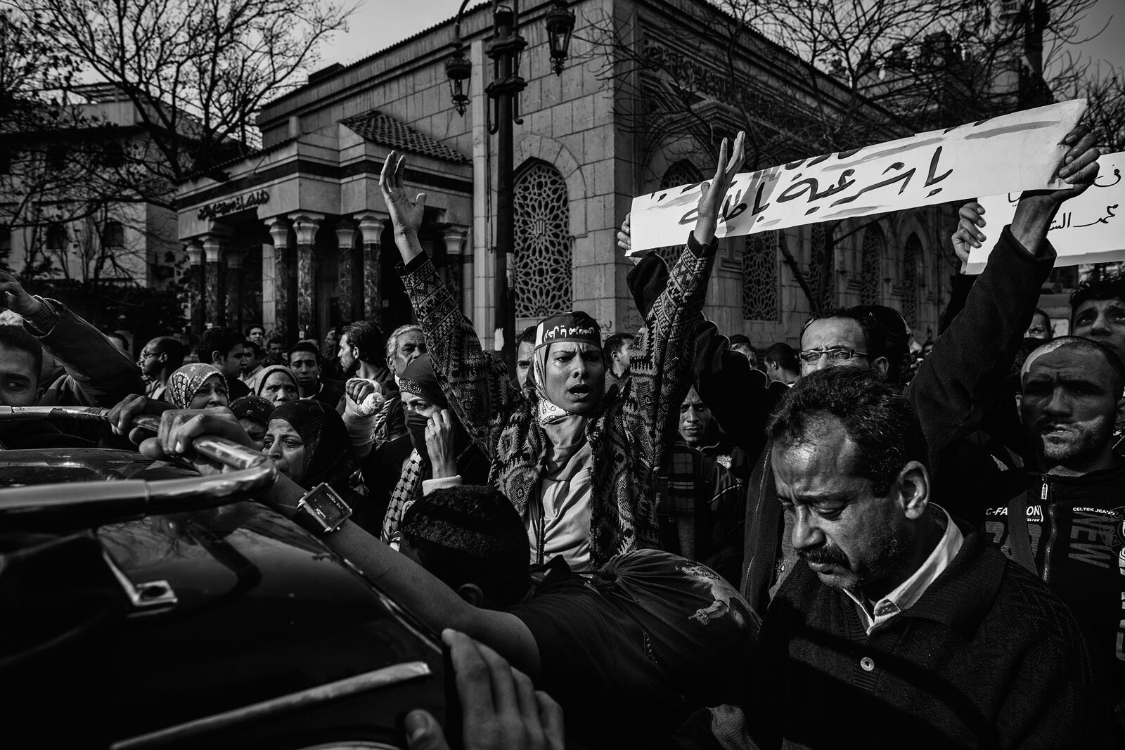  People attend the funeral of a  man killed by police forces during political unrest on Mar. 2013 in Cairo, Egypt. 