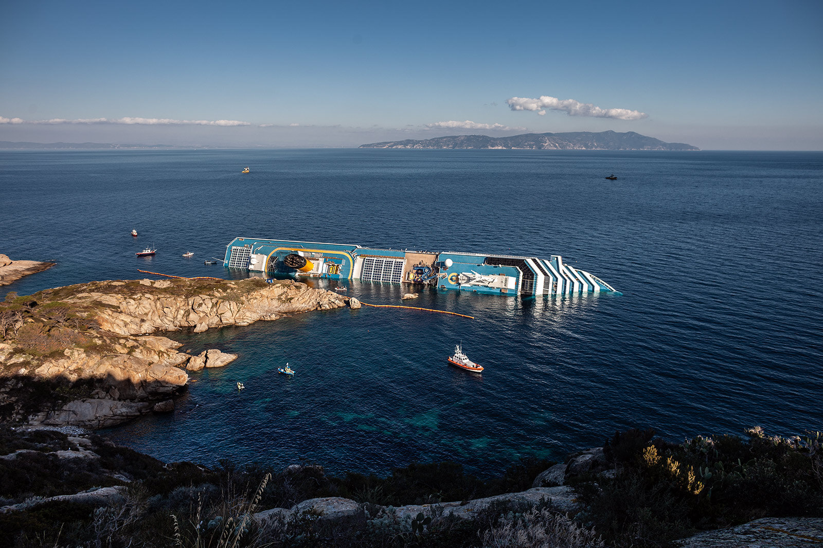  The wrecked cruise liner Costa Concordia lies aground after hitting underwater rocks on Jan. 2012 in front of Isola del Giglio, Tyrrhenian Sea, Italy.   