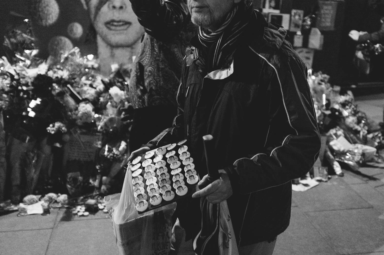 Opportunity knocks - a man sells 'Ziggy' badges