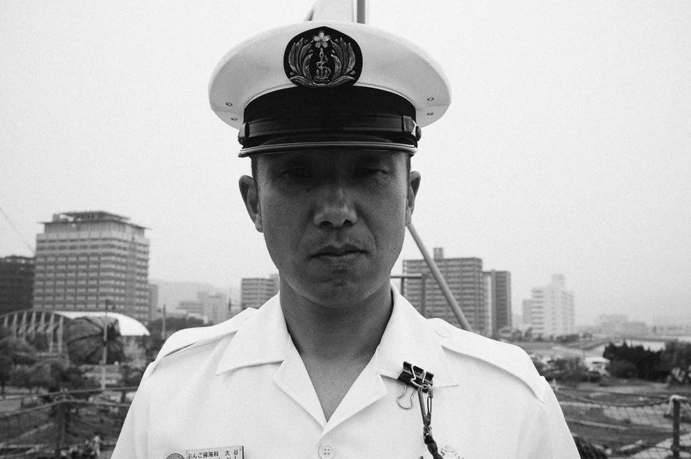 A Sailor from a Japanese Minesweeper. I have never seen a cleaner ship, it was spotless, the crew were great too.