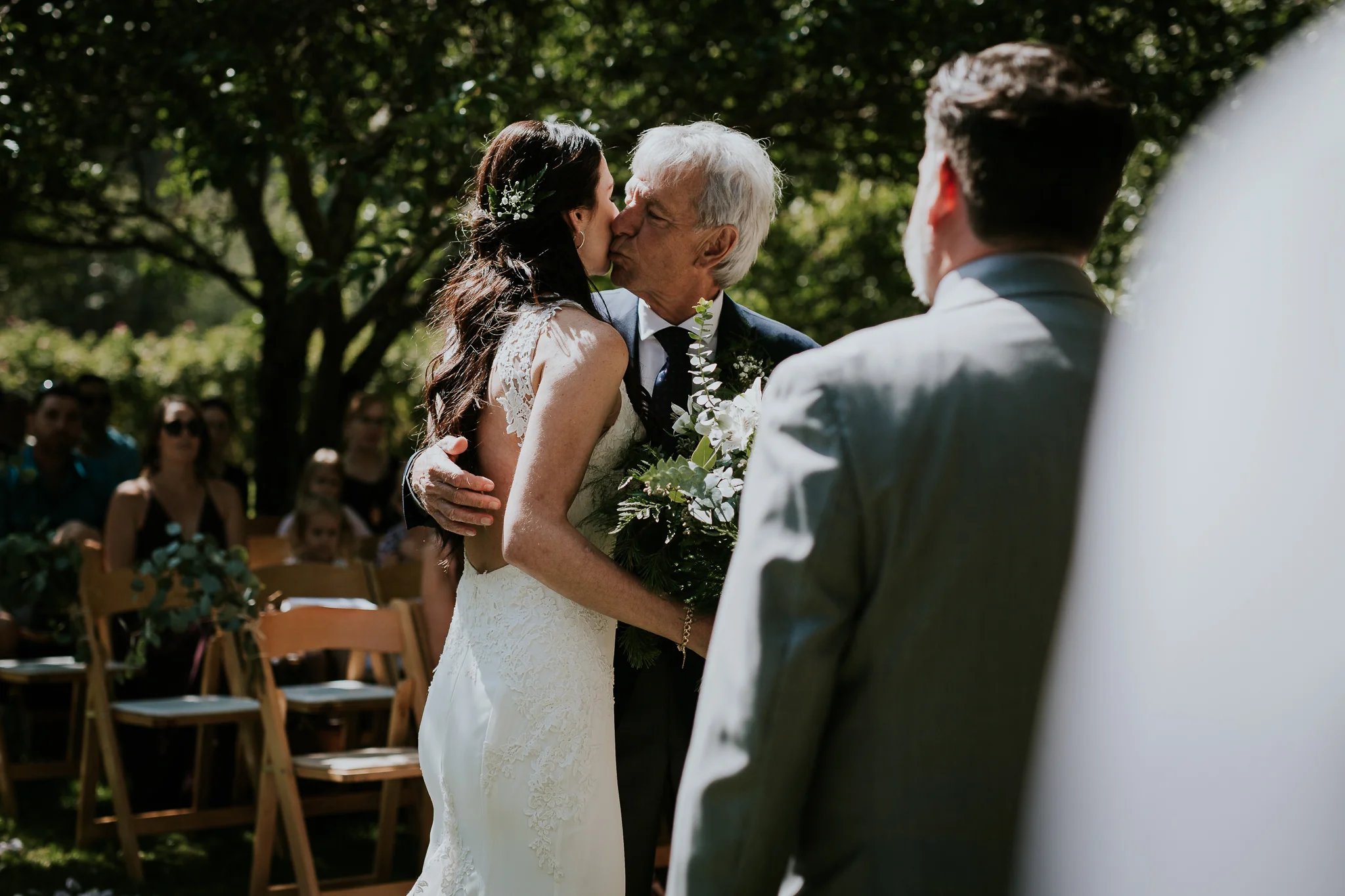 Brides father giving her away during ceremony at Starling Lane winery