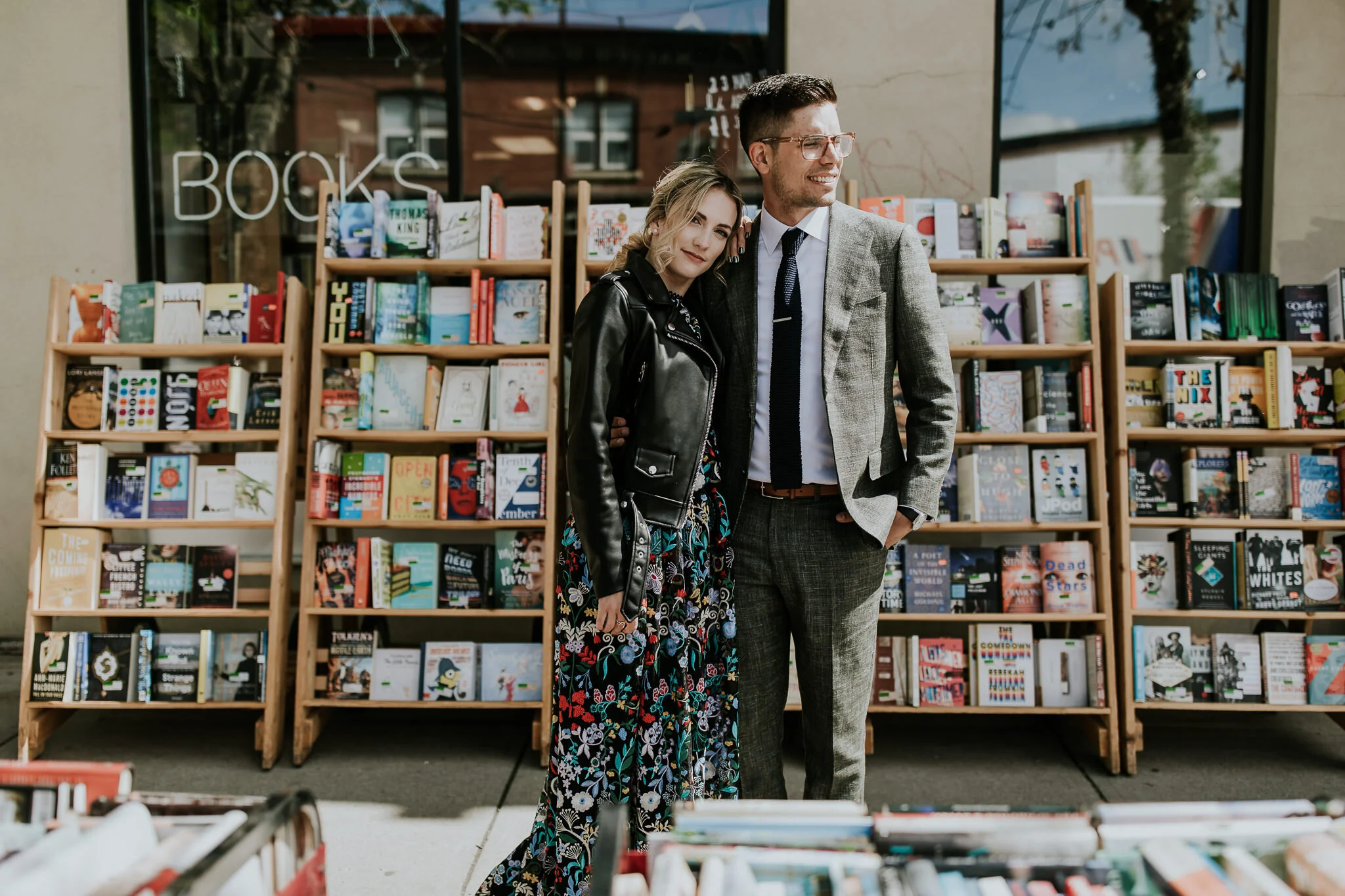 Edgy bride and groom in front of Kensington bookstore for quirky wedding photos