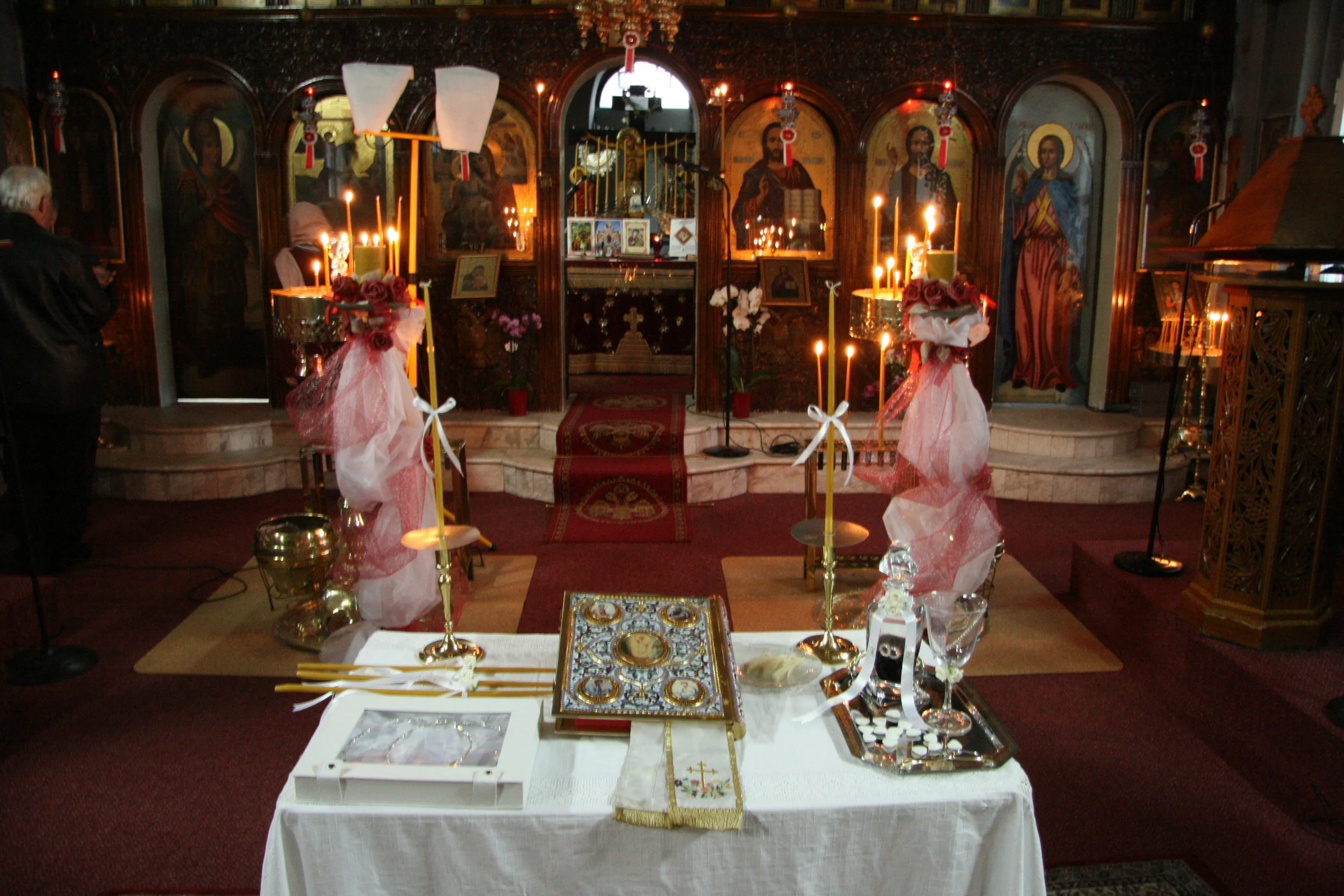 Facing front of church; altar visible thru central arch