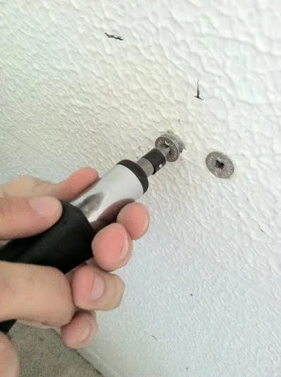 Screw them into the wall until they are flush with the surface.