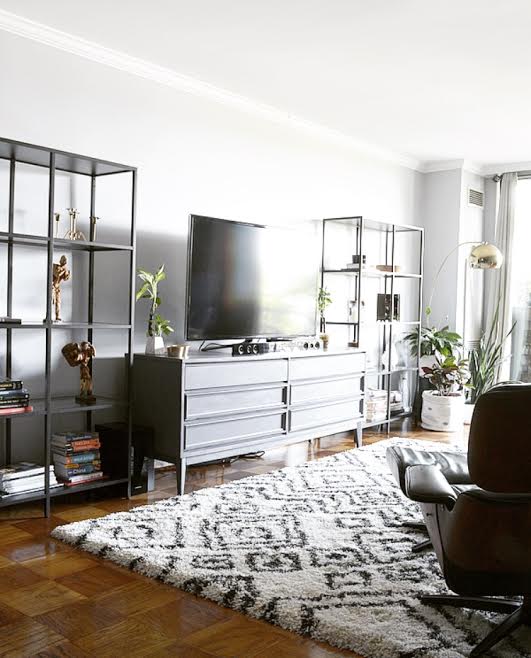 This statement area rug from PlushRugs , ( found here ) is as cozy as it gets, folks! A high pile like this keeps a sleek mid-mod space cozy, but the pattern slips right in with the style. Truly the best of both worlds!