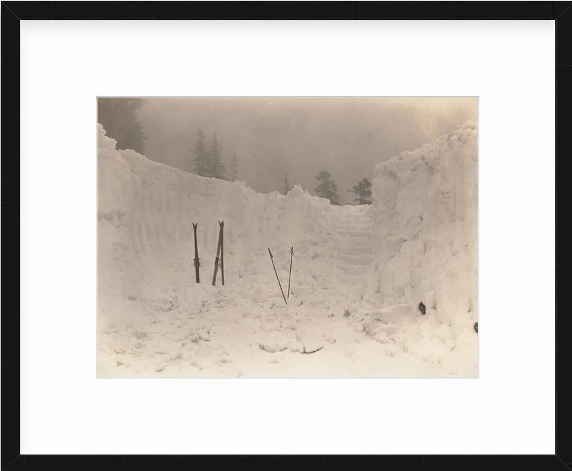 Just in time to shelter from an evening winter flurry, Eric (Hal) Pearson took this photograph looking out from the Lodge at Mt Baker. The snow so deep an entrance with steep cut-out snow steps was made. Hal and Mary Pearson, with a few friends would