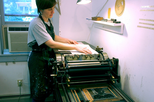 Leslie Nichols printing in the letterpress studio at Women's Studio Workshop