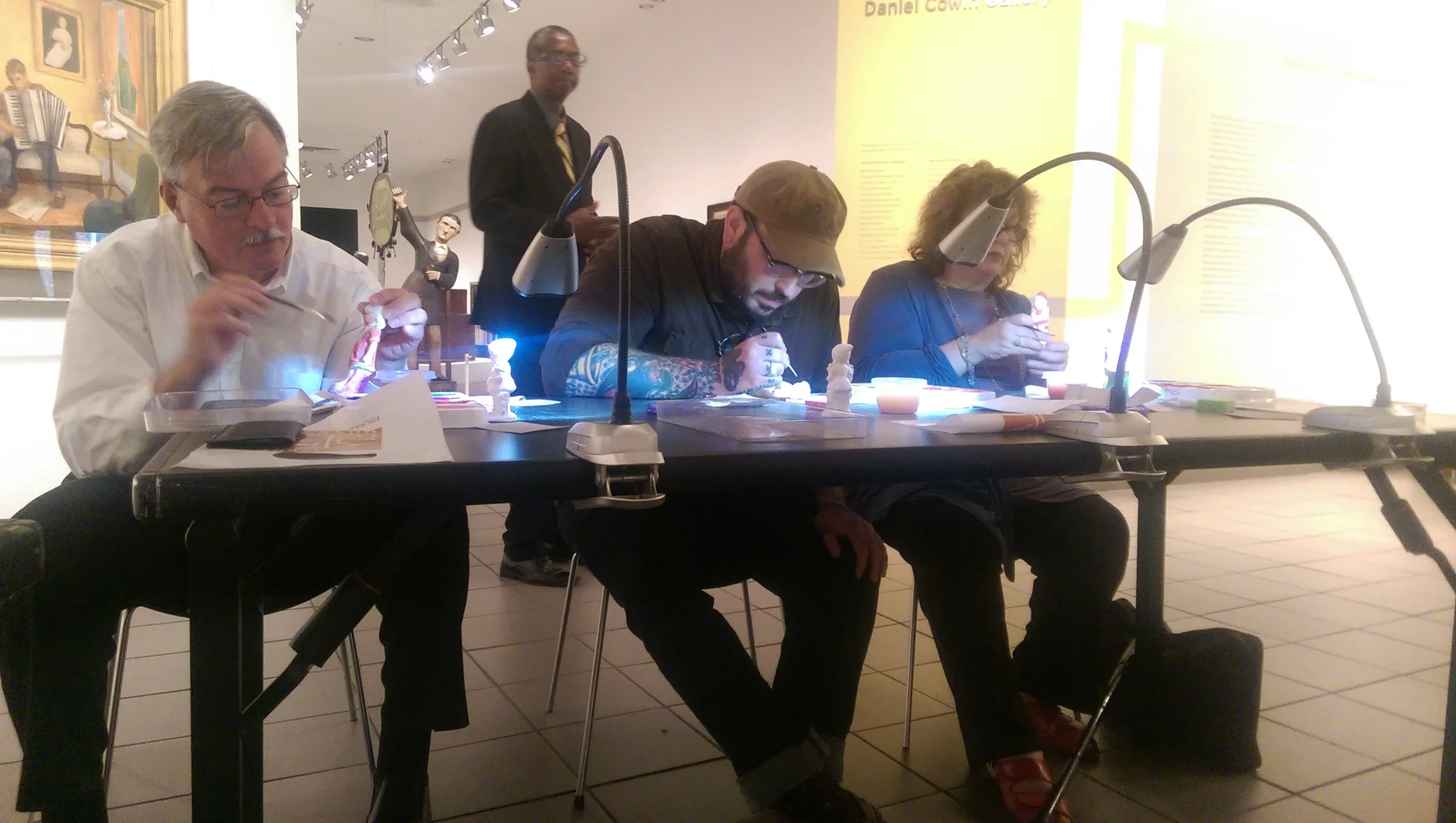 Students painting their figurines