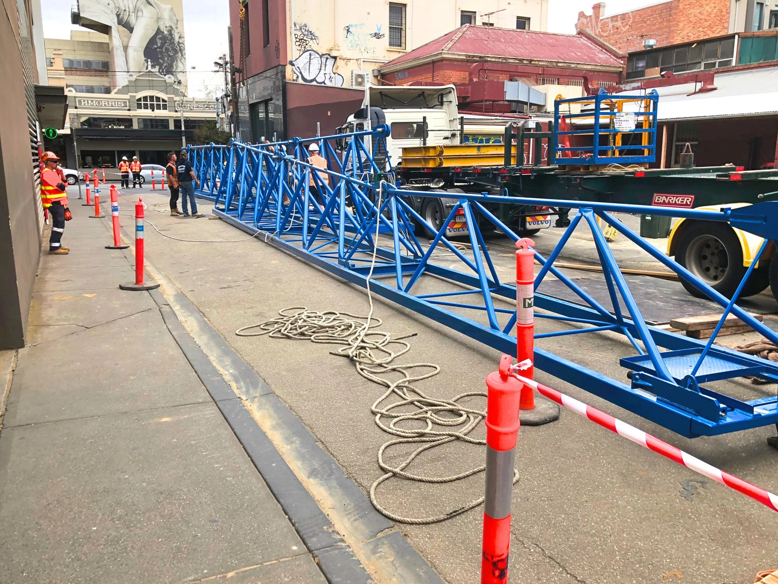 The crane resting on ground level before being erected vertically. Images courtesy of Balmain & Co.