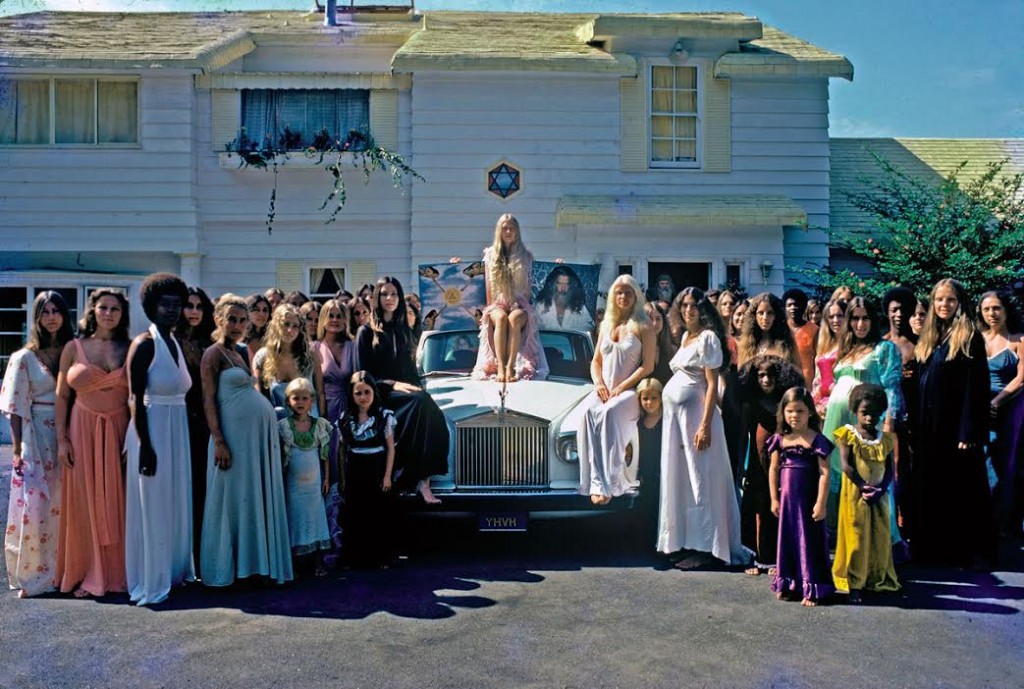 The Source Family, gathered for a portrait in front of the Father House. Courtesy of The Fox is Black .