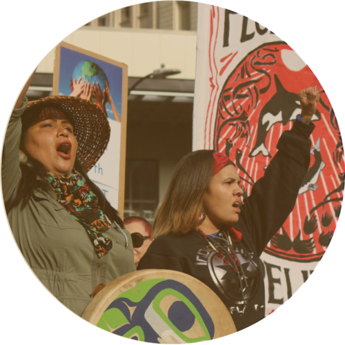 Roxanne White and Rachel Heaton at Divest the Globe protest, October 23, 2018. Photo– Sara Bernard