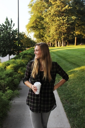 Senior Lindsey Parsons enjoying a large coffee. PC: Jorrdan Bissell