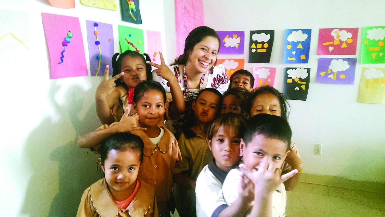 Ashley Pinto poses for a shot with her students. | PC: Ashley Pinto