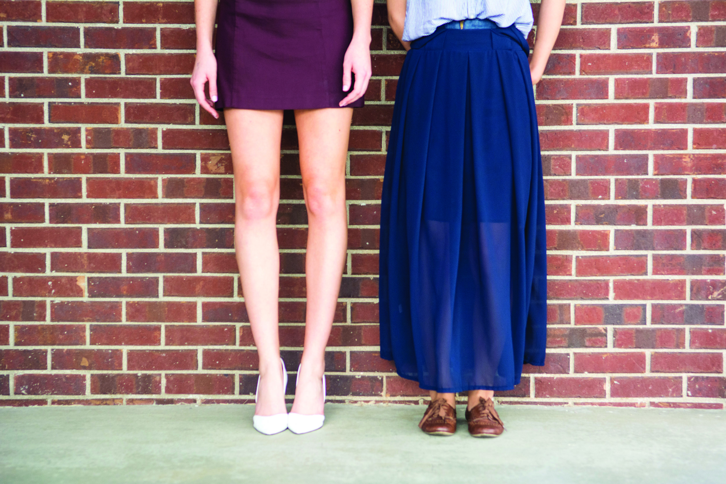 Two students pose to show contrasting styles of dress. | PC: Zach Morrison