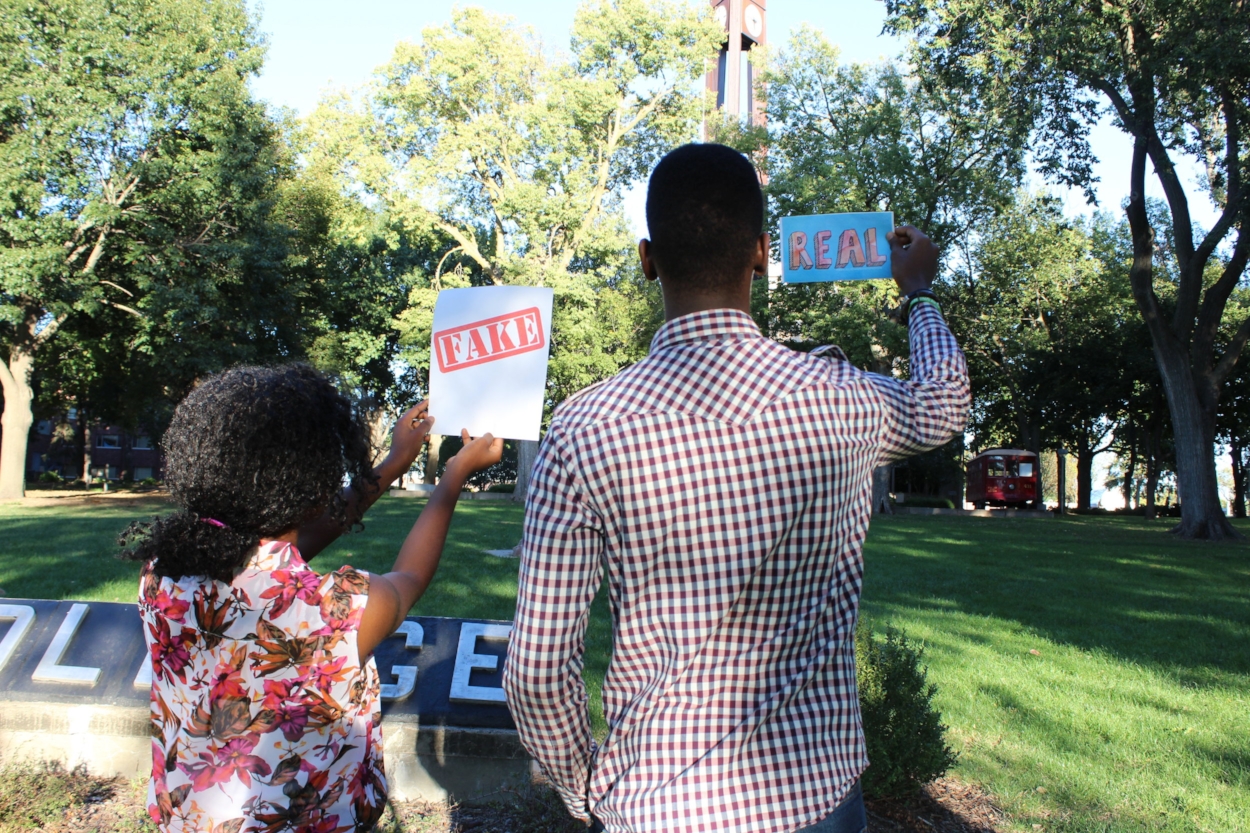 Two students show labels commonly applied to others. | PC: Kimberly Ortiz