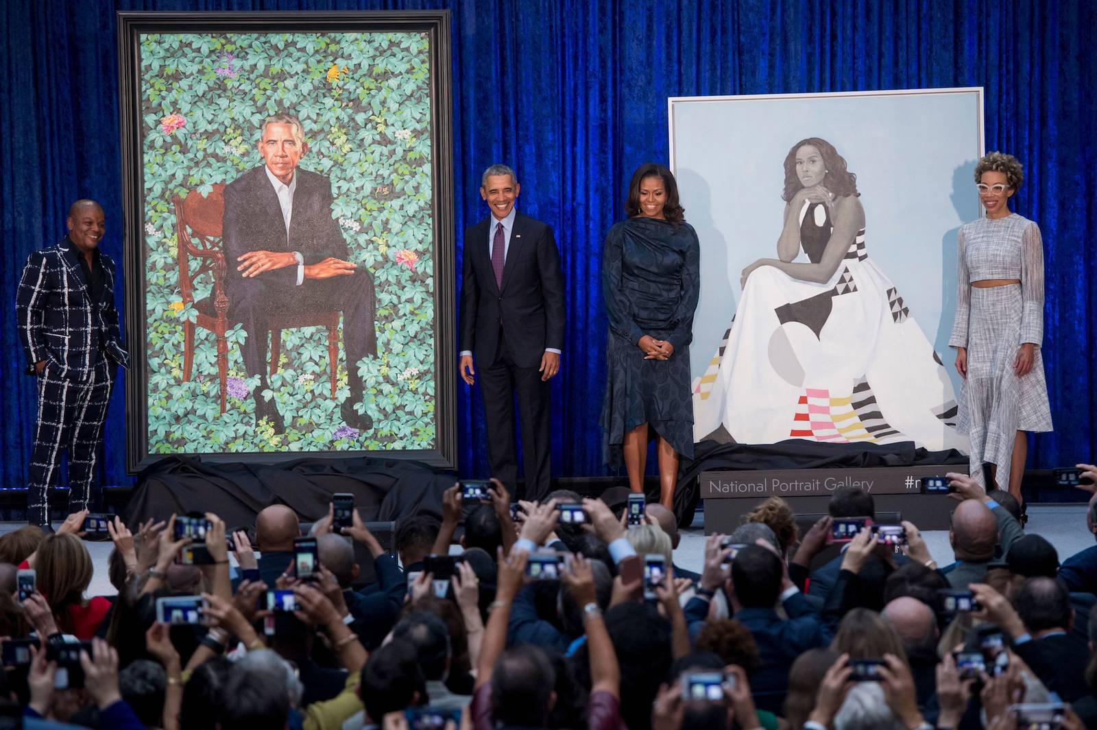 Former US President Barack Obama and First Lady Michelle Obama with their portraits and their respective artists Kehinde Wiley and Amy Sherald | PC: Saul Loeb—AFP/Getty Images