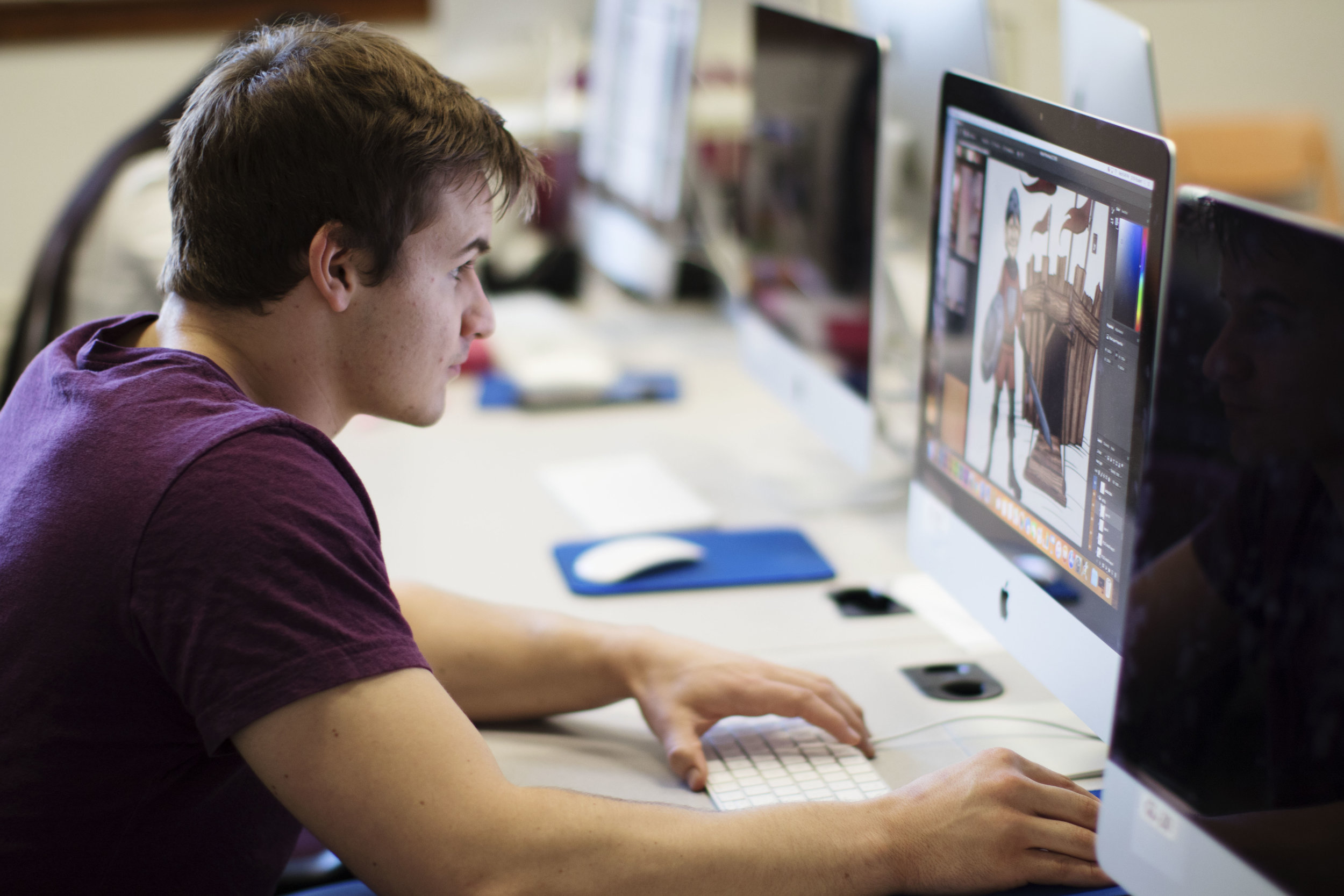Chandler working on his Design Portfolio | PC: Kayla Potts
