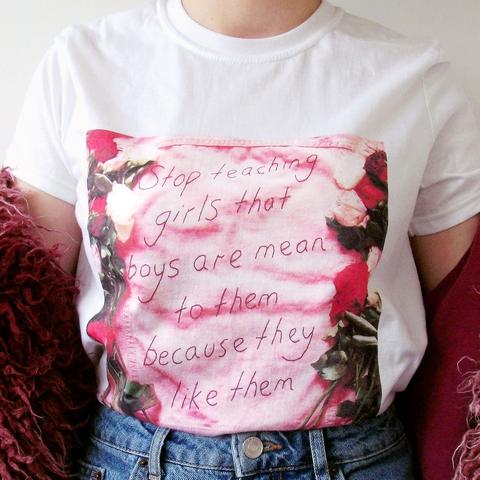 stop_teaching_girls_that_boys_are_mean_to_them_because_they_like_them_king_sophies_world_t_shirt_TEE_large.jpg