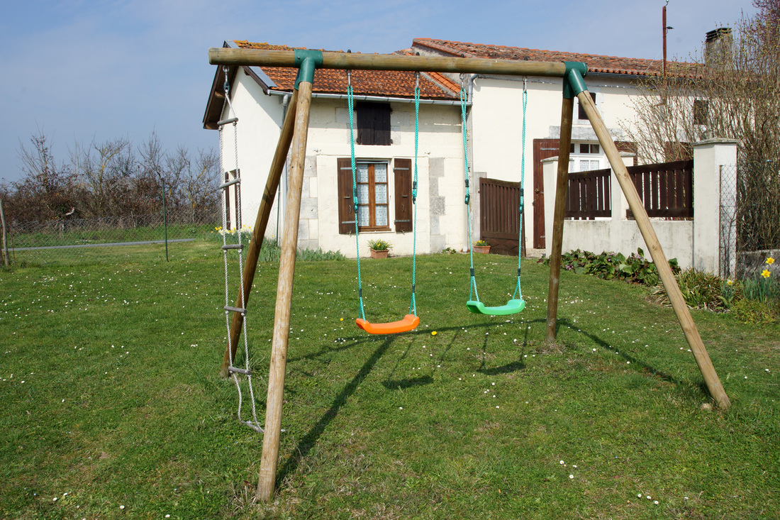 Play area with swings