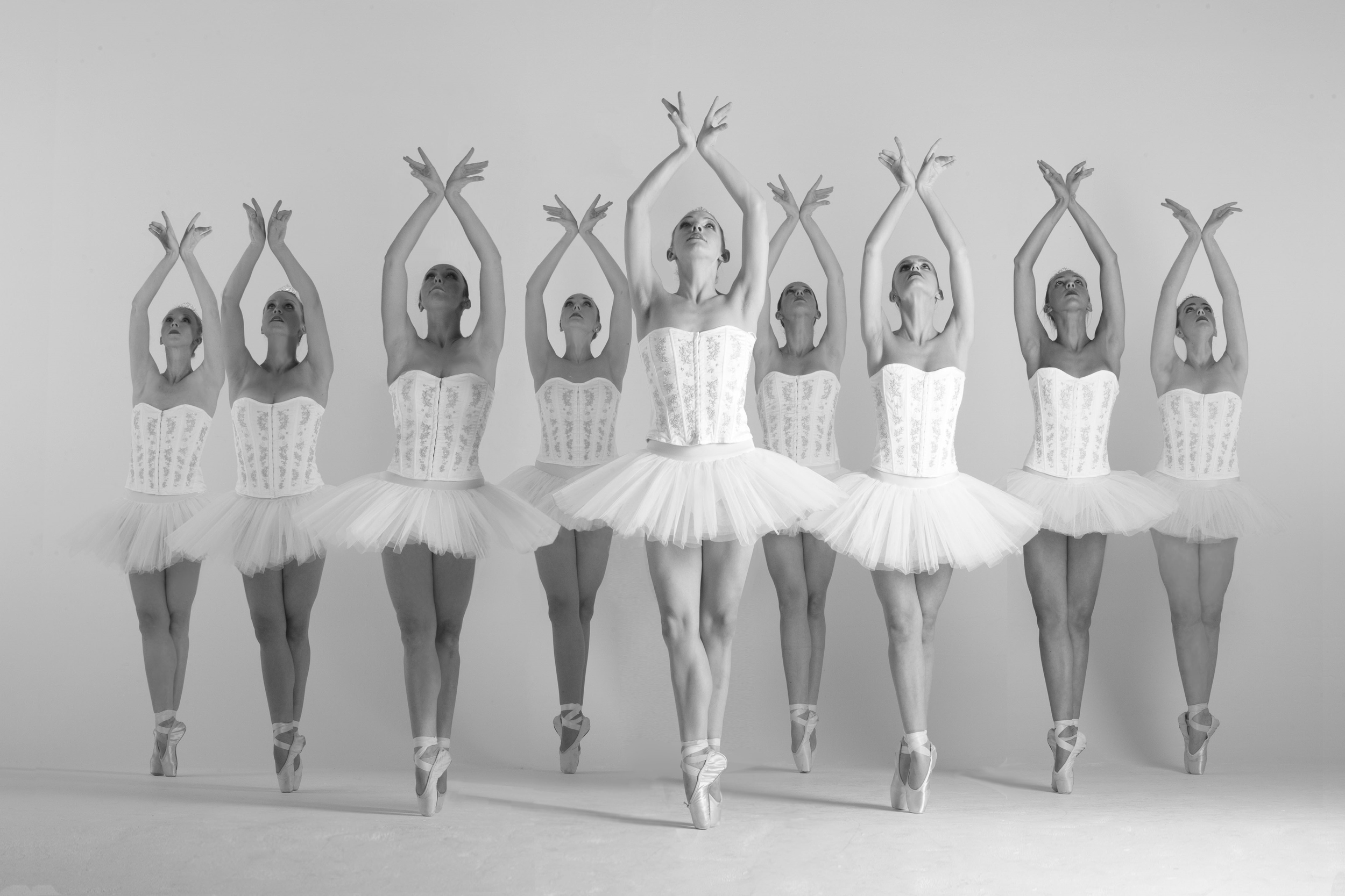 Classical Ballet in white on pointe, Divine Company.jpg