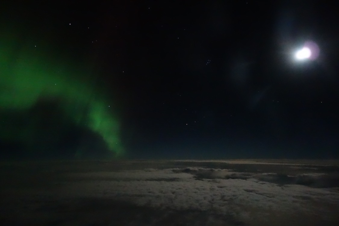 auroras and a full moon (by J Weiss)