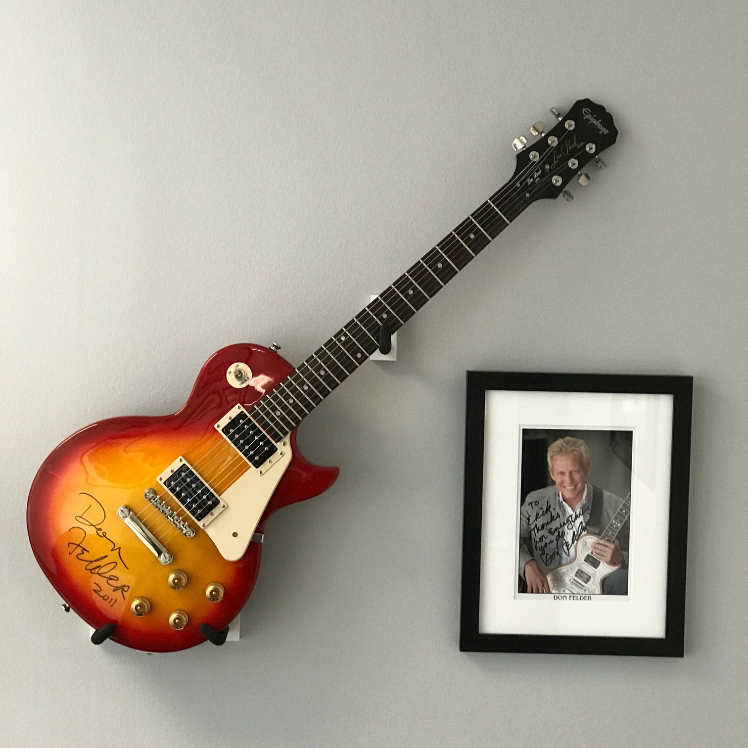 Don Felder Hotel California wall with guitar and signed pic.jpg