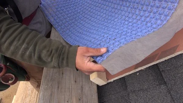 A close-up look at the Mortairvent rainscreen fabric, with its integral fine mesh face.