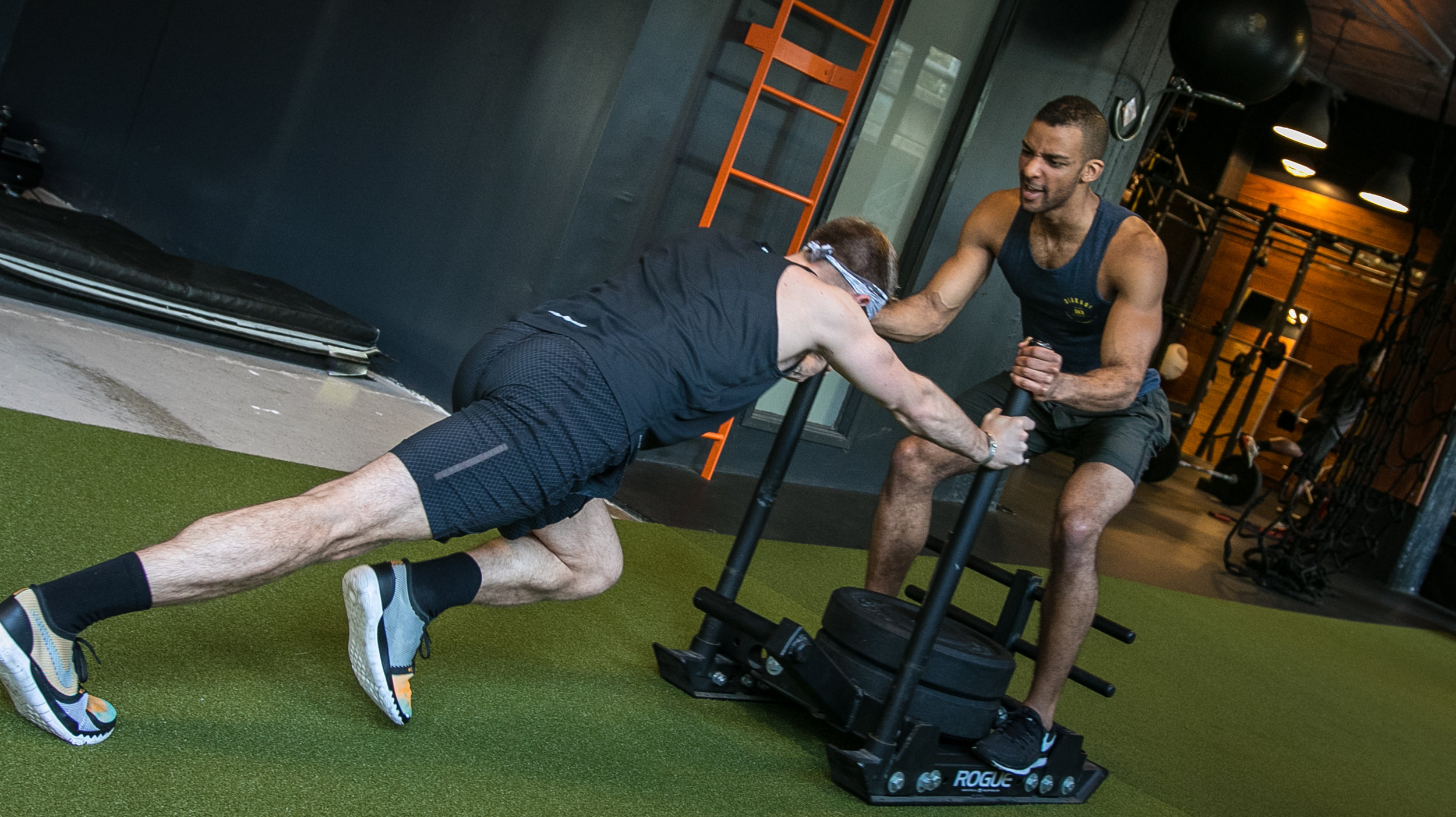 DIAKADI Trainer Joe Andrews sled push high intensity.jpg