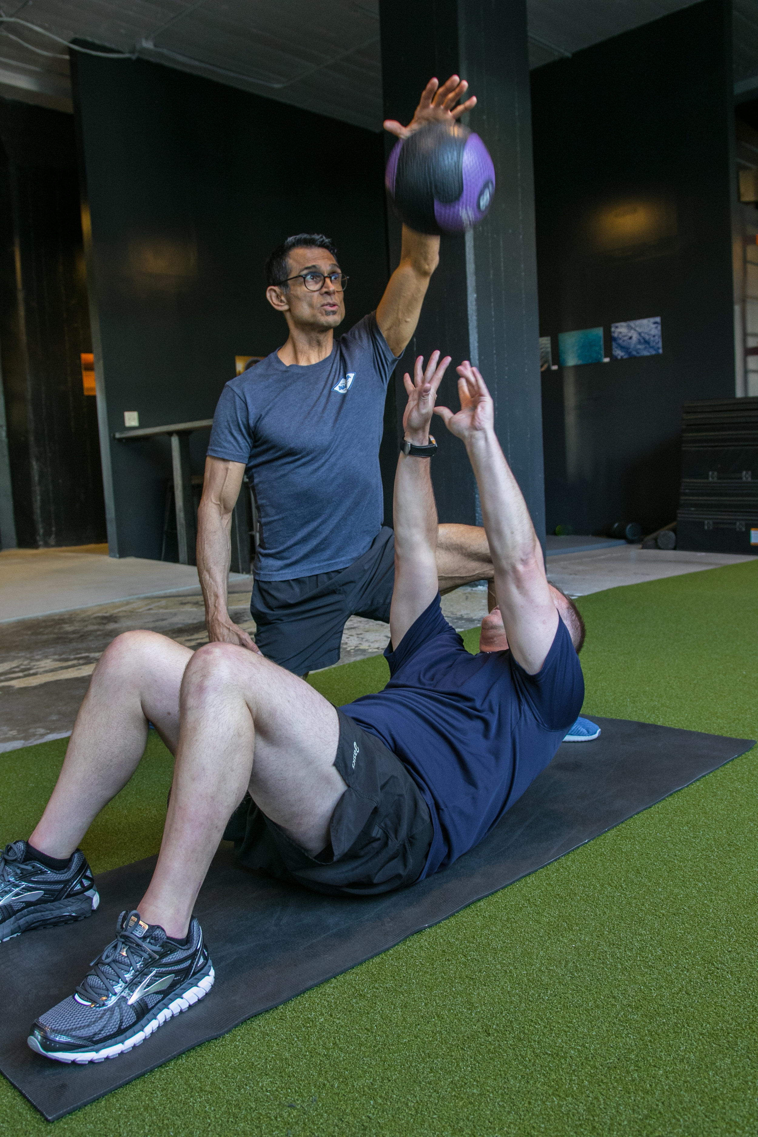 DIAKADI Trainer Jesse Garcia supine medball throws.jpg