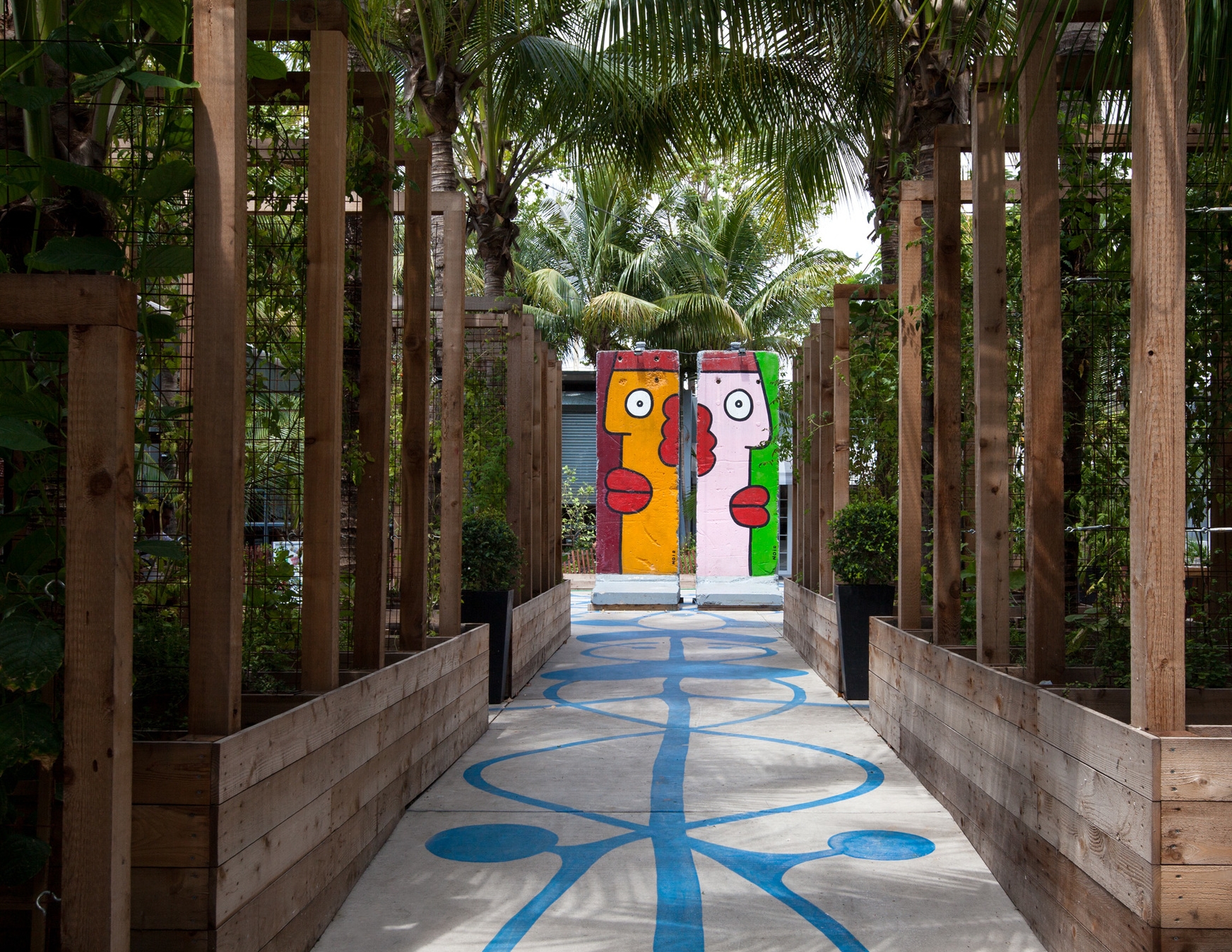 IRONSIDE proudly houses four double-sided segments of the original Berlin Wall repainted by Thierry Noir during ArtBasel 2013.