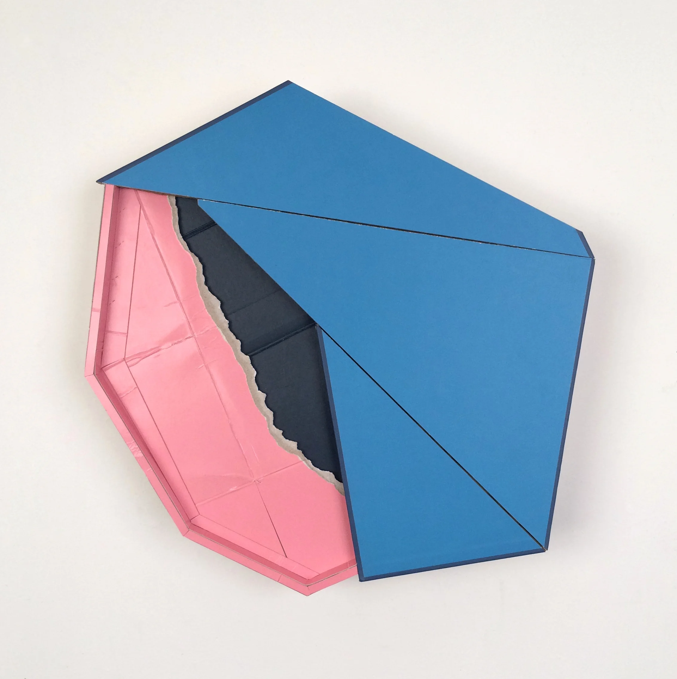    Surface find  , 2017  found (unpainted) cardboard, cut book cover, foamcore  15.5 x 15.25 x 3 inches       