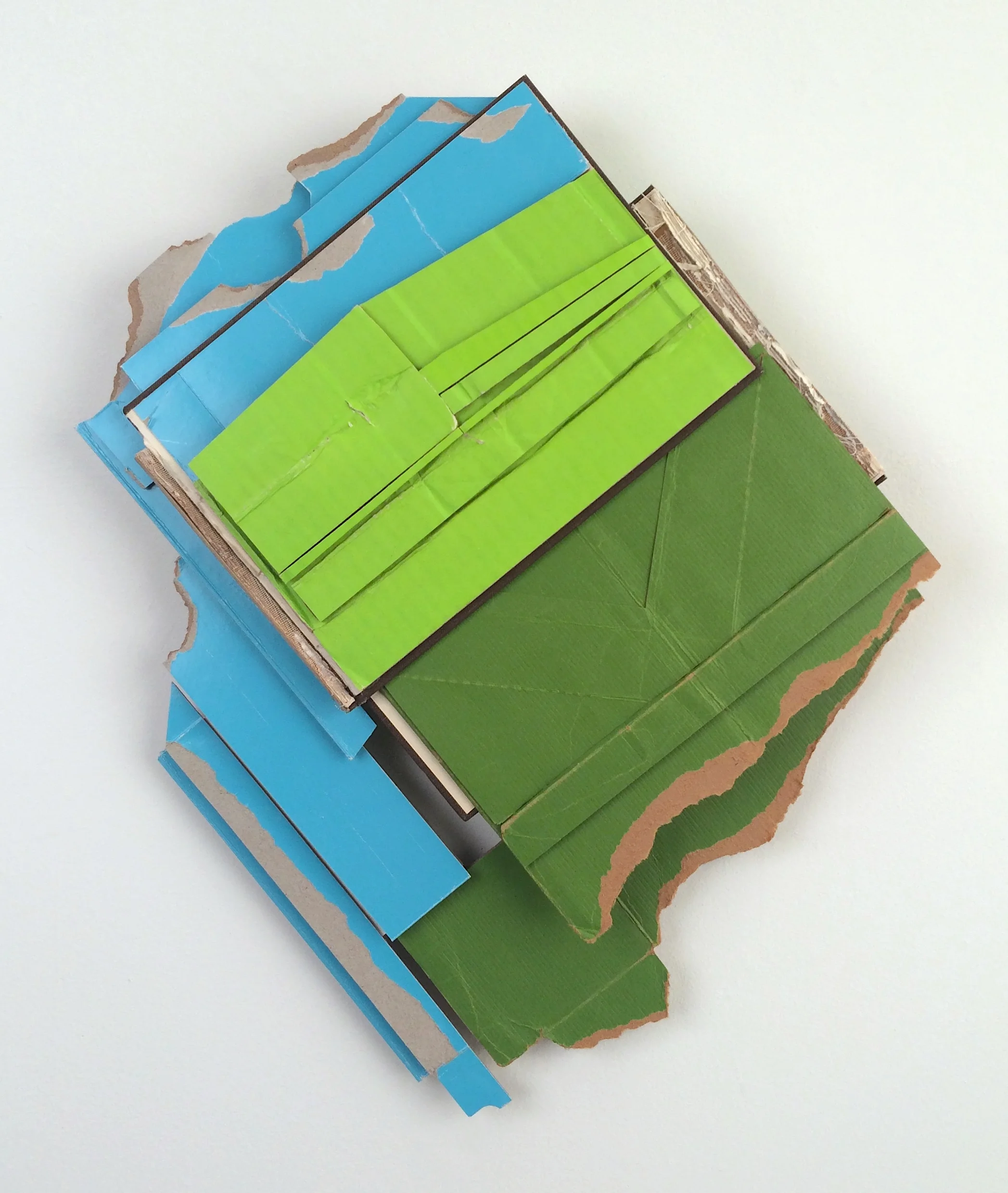 Track Record , 2018 found (unpainted) cardboard, cut book cover, foamcore 20.5 x 17 x 2.75 inches