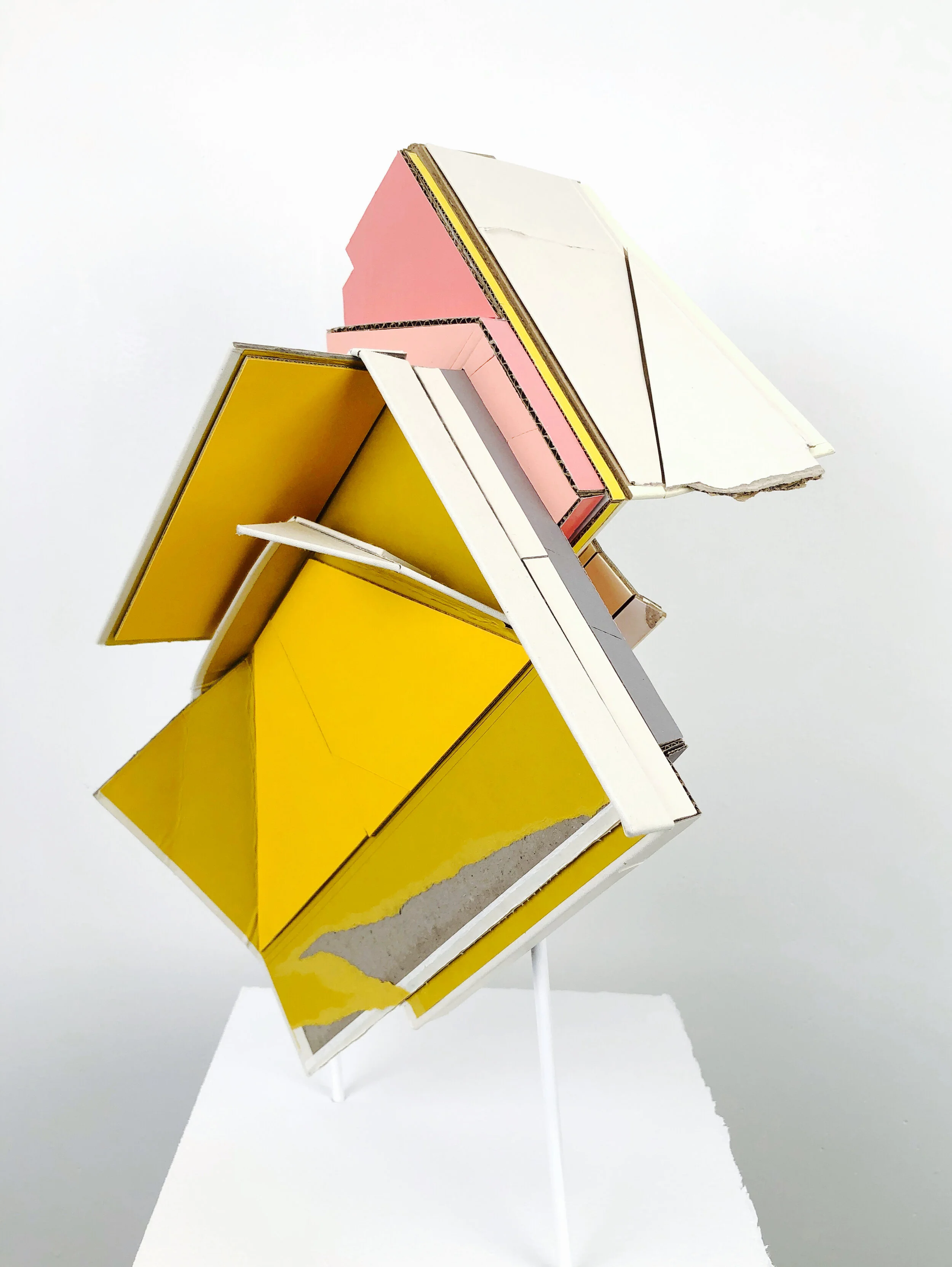    Carrier 4 (Hoist)  , 2020   found (unpainted) cardboard, cut book covers, foamcore, wood dowels   14L x 10W x 19H inches  