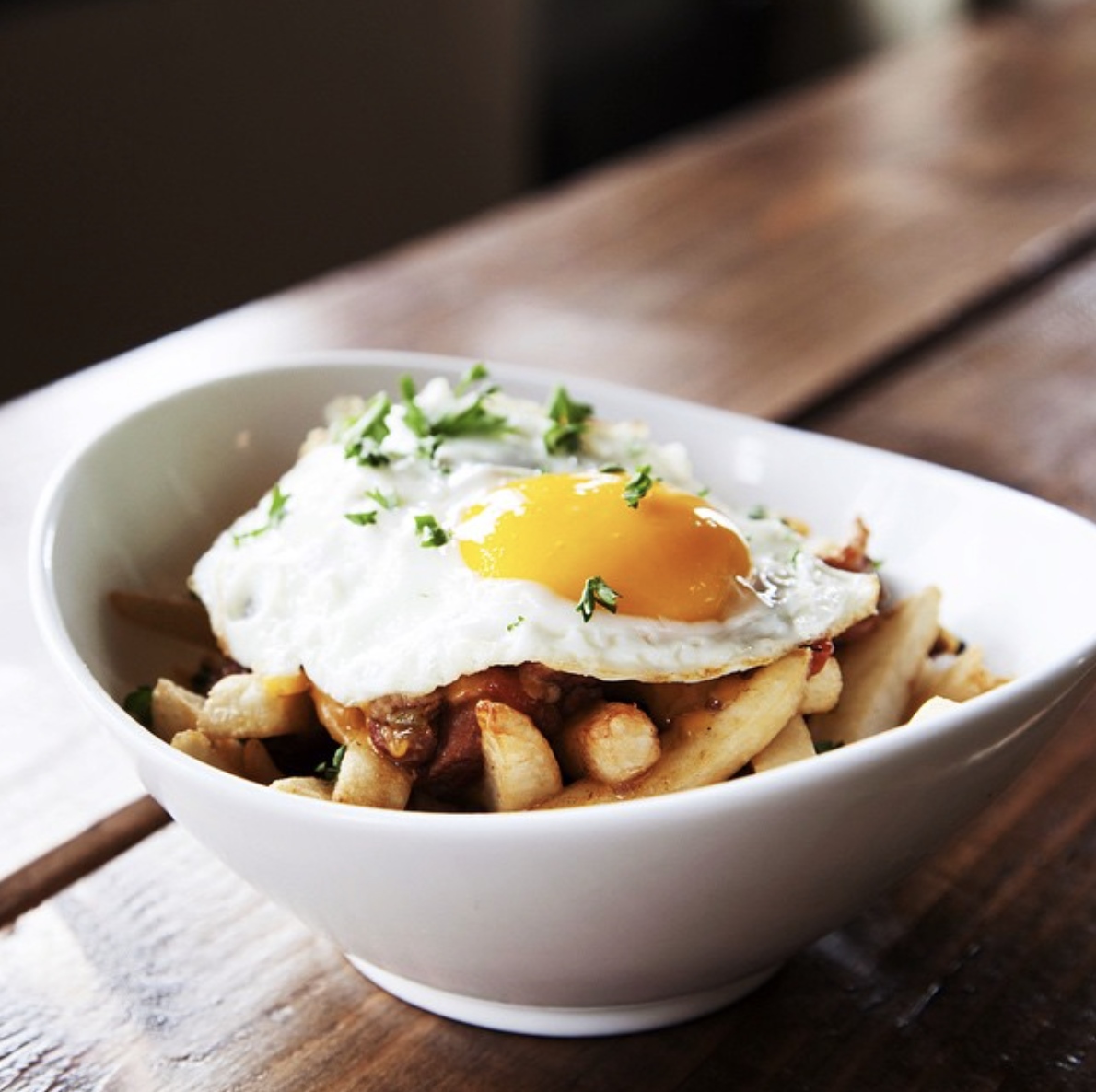 Eggs over fries