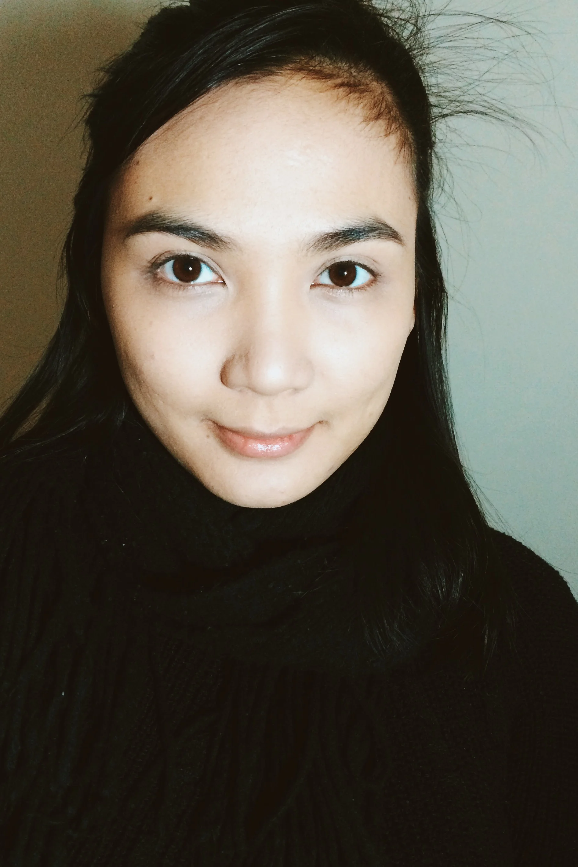 Here, I've already done my whole face. Really love my foundation! I also moisturized my lips!