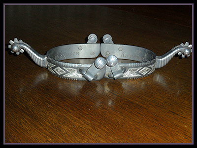 Cutter Style spurs, inlaid with fine silver 