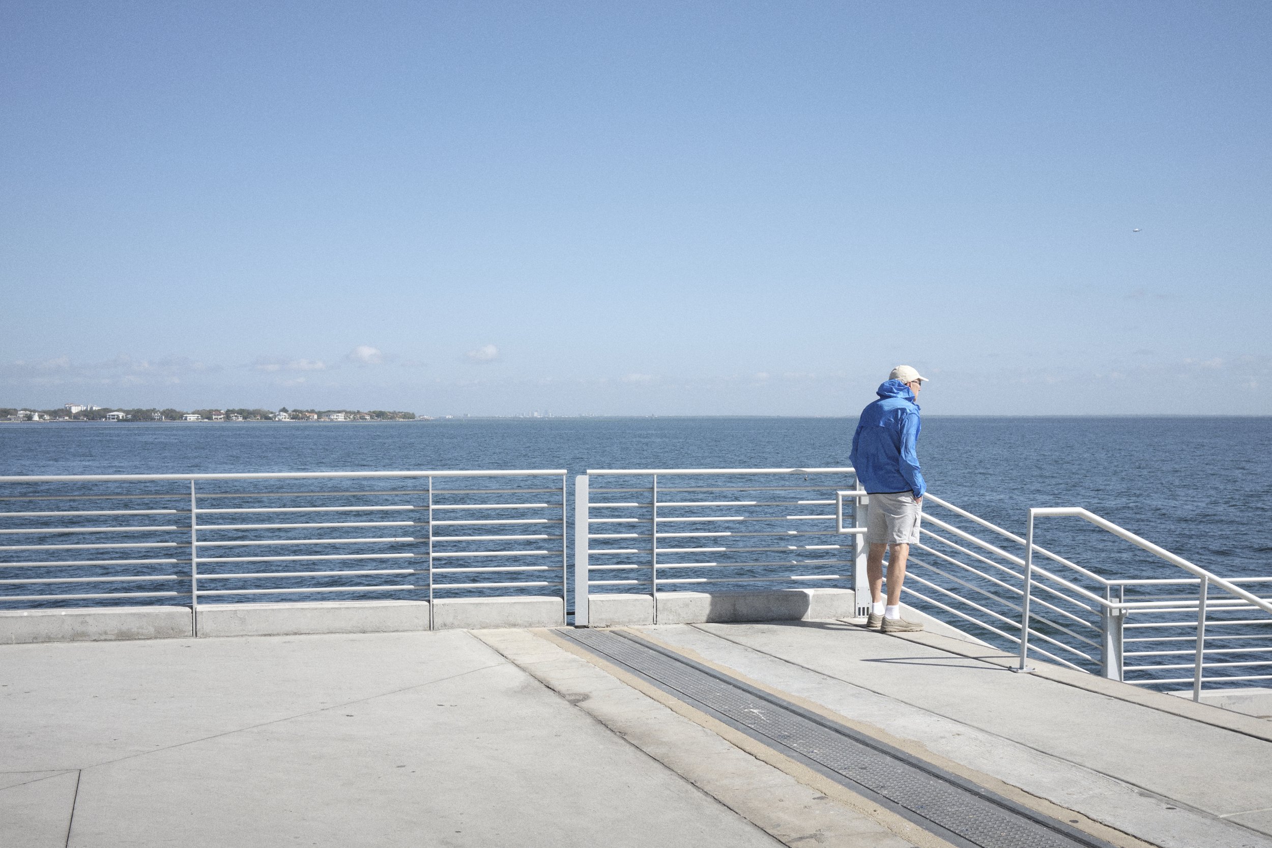man in blue at pier.jpg