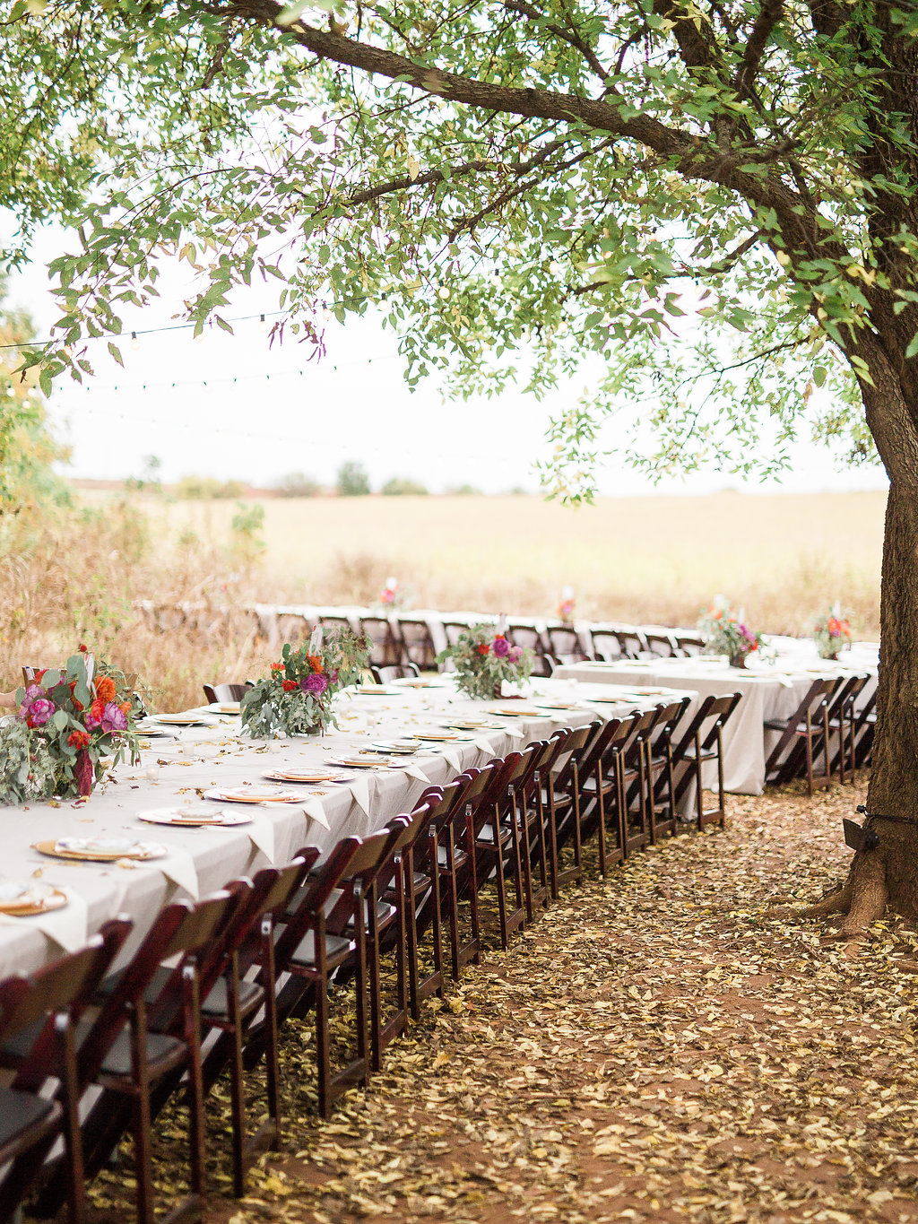 A perfect fall day! The fallen leaves could not be more beautiful as they somehow tie into the lovely gold accents on the table