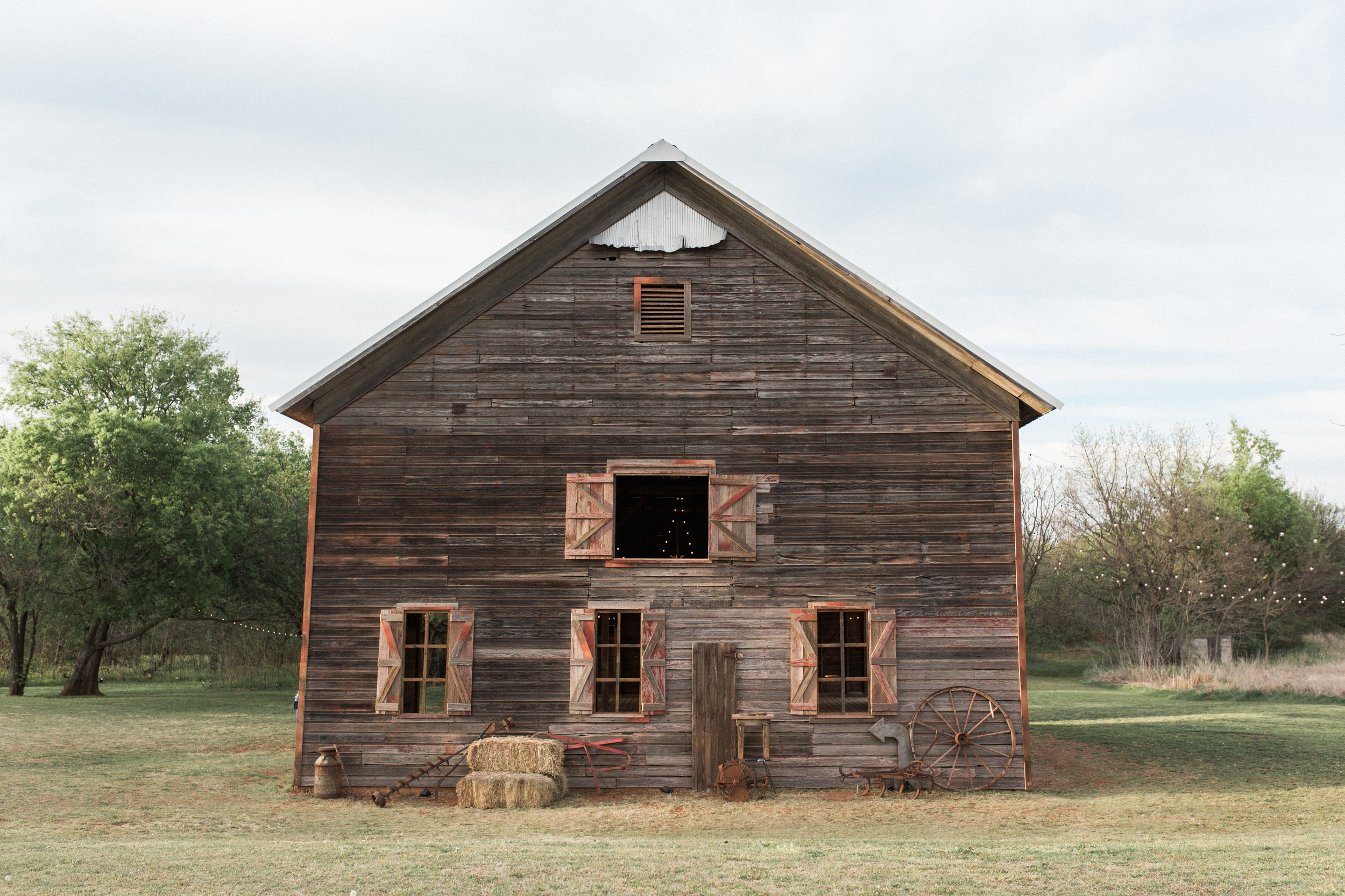  Old Barn Wood Supply is a company that salvages old barn wood to create something new and beautiful! This 100 year old wood was used to fill in all the holes and build beautiful new doors and shutters for our barn! 